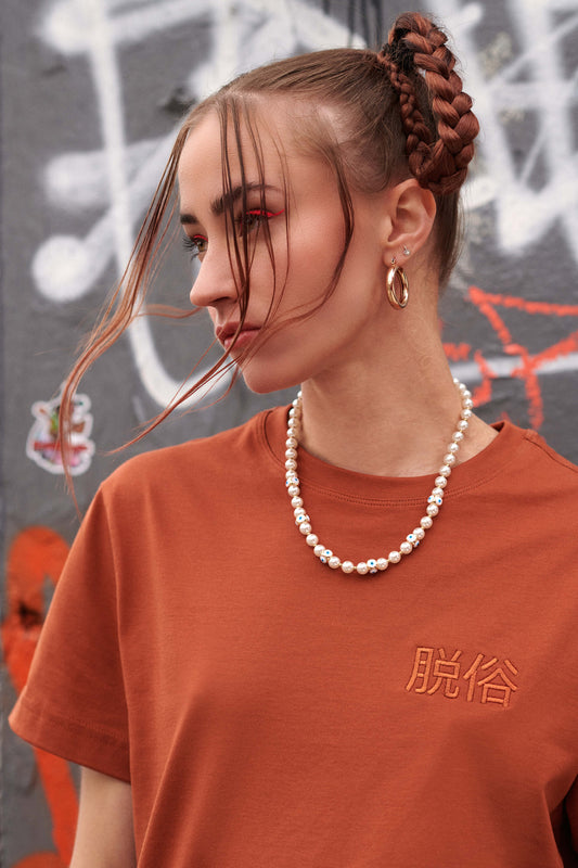 nM Datsuzoku Tee